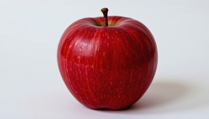 a ripe apple, white background, vibrant red, glossy skin, 4k resolution