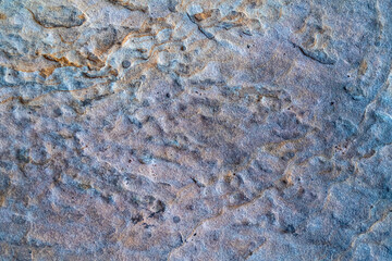 Organic stone background with rustic earth colors.