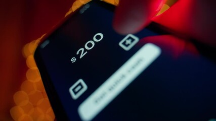 Receiving money through a mobile app. A fictional app for quick money loans, close-up