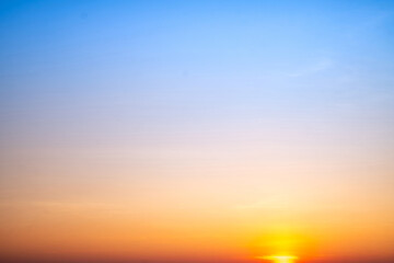 Beautiful , luxury soft gradient orange gold clouds and sunlight on the blue sky perfect for the...
