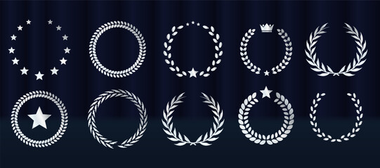 Elegant award emblem set features gold laurel wreath badges. Vector collection includes ribbons, stars, crowns for winners. Luxury nomination graphics suit best player recognitions. Certified prize