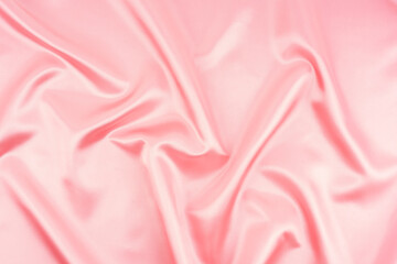 Smooth elegant pink silk or satin texture can use as wedding background.