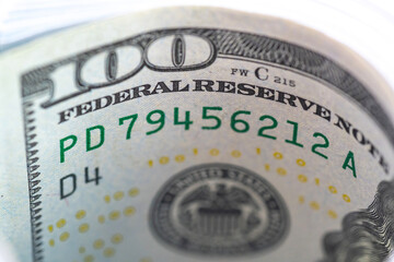 Macro shot of the new design hundred dollar bill.