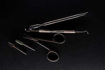 Manicure and pedicure set. Scissors, nippers, cutter, curette. Beauty and fashion concept. Beauty...