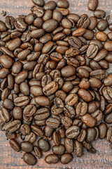 Fresh organic raw coffee beans background