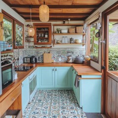 Cozy kitchen interior with blue cabinets, wooden countertops, tile backsplash, and patterned floor tiles in Bali home