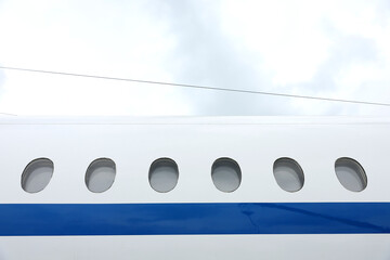 Airplane window from the outside at the airport.