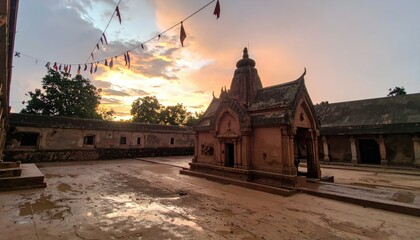 Fototapeta premium Serene Sunset Over Ancient Temple Surrounded by Nature's Beauty