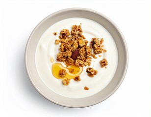 Creamy white yogurt bowl with granola and a drizzle of honey. A healthy breakfast overhead