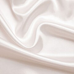Naklejka premium A smooth, luxurious white silk fabric drapes elegantly, showcasing its soft sheen and delicate texture, creating a serene and sophisticated backdrop.