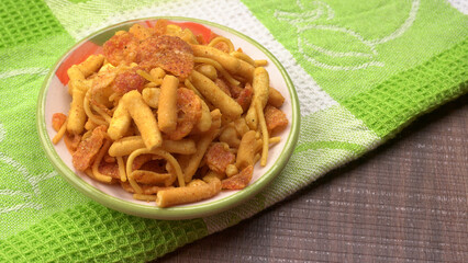 Indian Snacks, Traditional Indian deep fried salty dish called chivda or mixture or farsan made of...