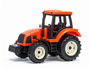 Orange tractor toy has black tires and driver's seat against white background