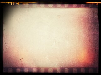 Old negative photo film with grain scratches dust, film grain  photo overlay background, light leaks texture effect. Grainy negative photo film textures