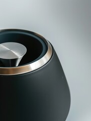 A modern electric kettle, matte black body 