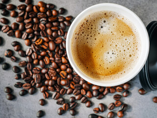 Coffee crema espresso in paper Coffee cup and bean on gray background, Top view of Espresso in  Takeaway paper coffee cup.