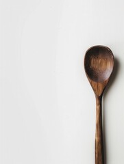 A single wooden spoon, natural grain texture, placed flat on white background, top-down view, soft diffused shadows, minimal and clean, high-detail 