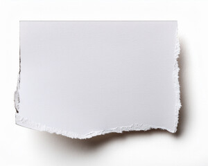 Obraz premium A ripped piece of white paper on a white background
