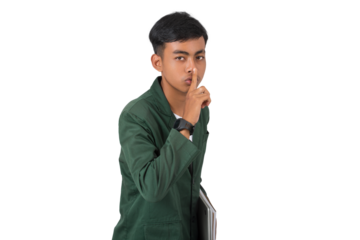 Young college student finger on lips asks to be quiet isolated background