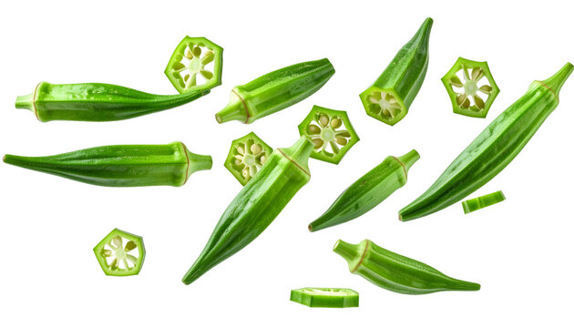 Multiple okra pods and slices falling against transparent background