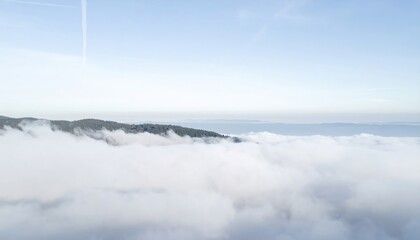 Obraz premium Serene fog covering hills coastal view nature photography tranquil environment aerial perspective