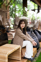 Portrait of young woman in a cafe