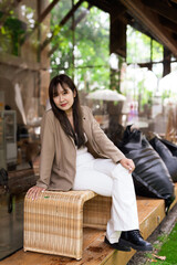 Portrait of young woman in a cafe