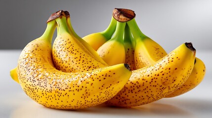 Spotted bananas in ripe yellow arrangement