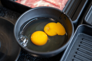 Raw egg in a bowl