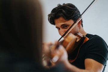 A passionate musician engaged in playing the violin, exuding dedication and capturing the essence...