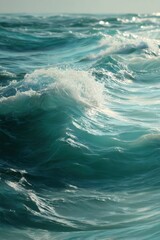 Fototapeta premium Ocean waves rolling in sunlight, turquoise sea water, dynamic seascape, vertical shot, nature photography, summer vacation, coastal scene, tranquil atmosphere