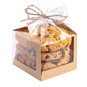 A stack of chocolate chip cookies neatly arranged in a gift box tied with a string bow.