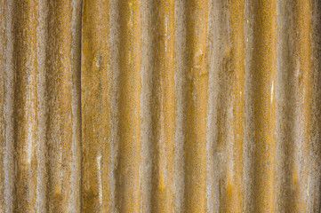 Pattern of rusty corrugated old galvanized sheet.