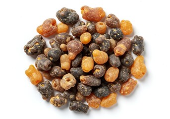 Fototapeta premium A small pile of coated nuts on a white background close up