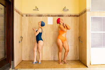 A young couple of girls enjoy a day at a spa.Women shower before entering a spa. Concept of hygiene...