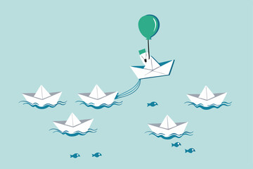 Think different, innovation to change from routine traditional thinking concept, stand out origami paper boat flying with air balloon in different path instead of follow others.