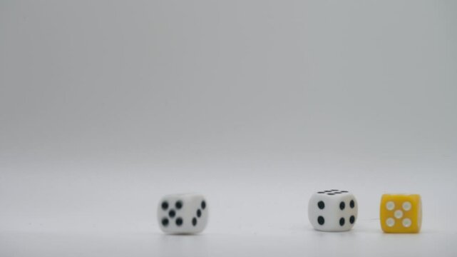 Colorful dice thrown on white background