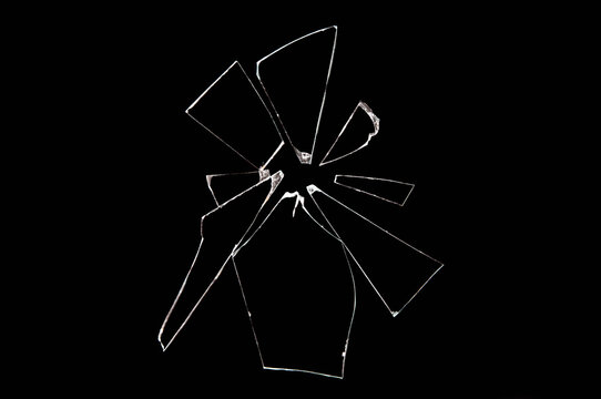 broken glass shards isolated on black background