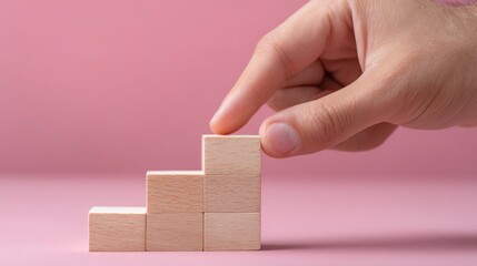 Placing Wood Block on Stack Showing Growth and Progress