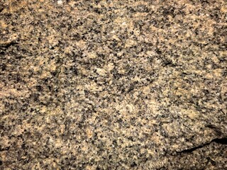 Speckled Brown and Black Granite Stone Surface