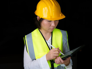 factory woman workers or technicians civil Engineer or Architecture project management using tablet at work.
