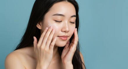 Skincare routine concept with woman applying moisturizer on clear complexion for beauty and wellness