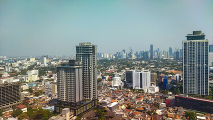 Fototapeta premium Modern Skyscrapers and Dense Urban Housing in Developing Country Cityscape