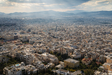 Athens in Greece on a sunny day viewed from above. Urban skyline, metropolis and city view.