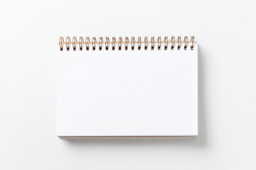 Spiral bound blank notebook on a clean white background ready for creative ideas and notes
