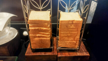 White and Whole Wheat Bread Slices on Breakfast Buffet Display