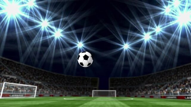 A soccer ball is in the air with lights shining on it