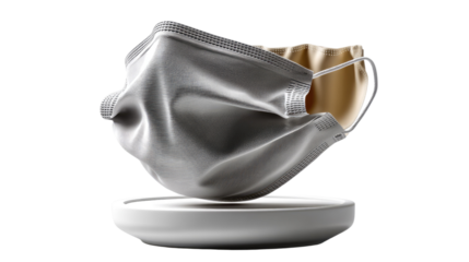 Symbol of Protection: An abstract, studio shot of a medical mask, symbolizing health, safety, and the protective measures of a contemporary era.