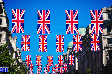 The 80th Anniversary Of Victory In Europe Day, Celebrating VE Day, End Of WWII, Union Jack National Flags, British Identity, Buildings Facade On Regent Street, London, England, United Kingdom
