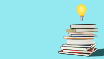 Idea and knowledge. Light bulb in air over stack of books against turquoise background, space for...