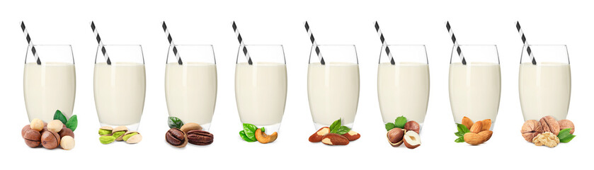 Different types of nut milk in glasses isolated on white, set